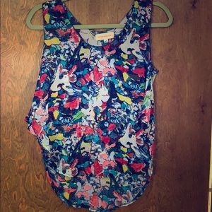 Shear, flowy blouse with vibrant print